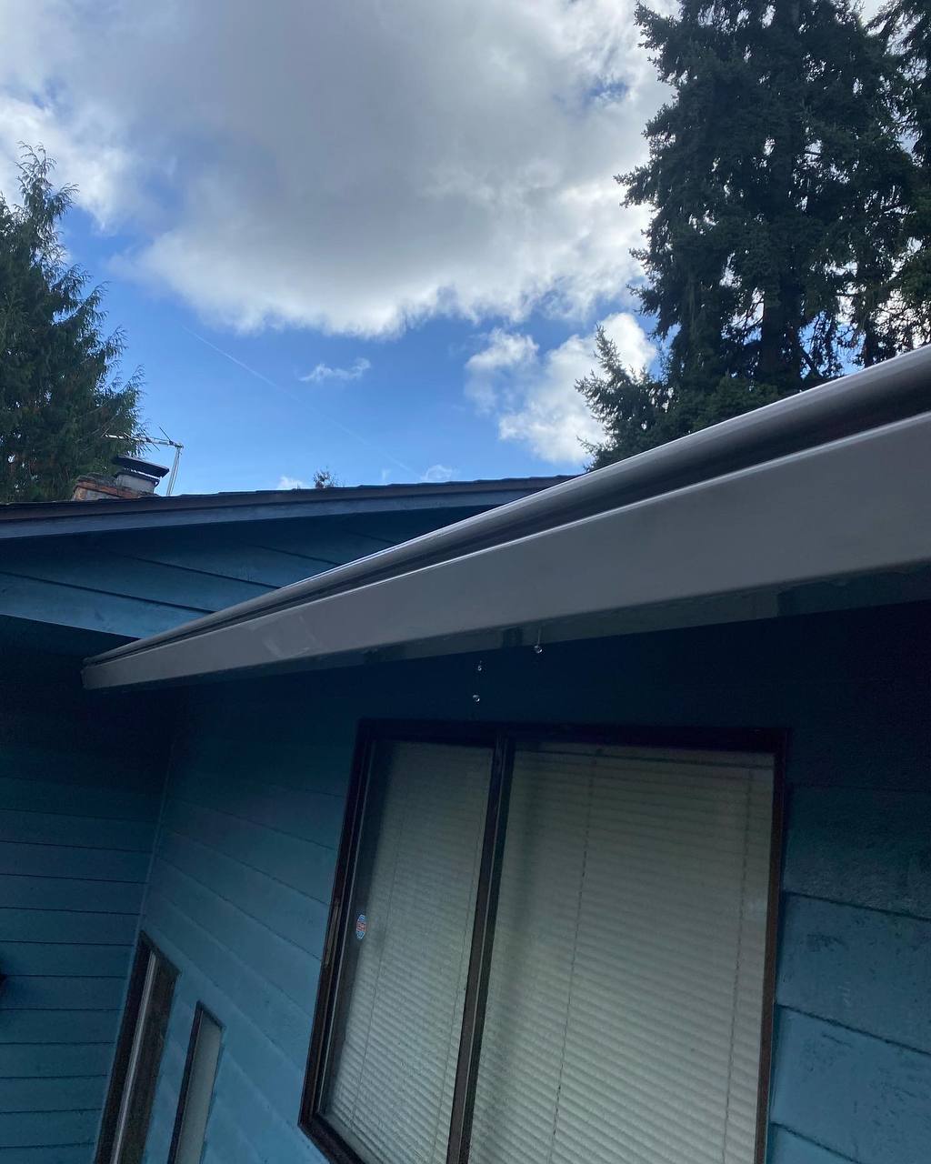 Bright clean white gutter after gutter whitening service in Seattle